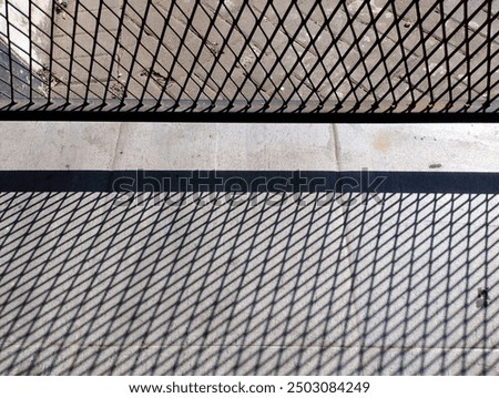 Geomtric pattern gate background with its shadows 