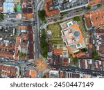 George Town, Malaysia: Aerial top down view of the historic George Town UNESCO city center with the Kapitan Keling Mosque in Penang island.