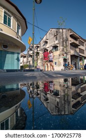 George Town, Penang/Malaysia - Apr 30 2017: Reflection tourist walk at street in Penang.