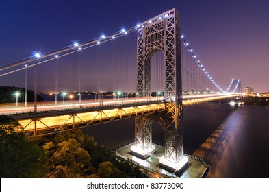The George Washington Bridge spanning the Hudson River at twilight in New York City. - Shutterstock ID 83773090