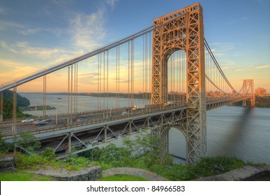 The George Washington Bridge spanning the Hudson River at twilight in New York City. - Shutterstock ID 84966583