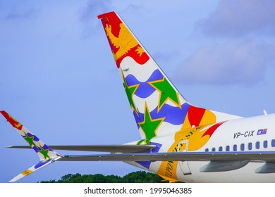 Georgetown, Grand Cayman, Cayman Islands, June 19th 2021: The Cayman Airways logo displayed on the tail of a Boeing 737 max 8 airplane