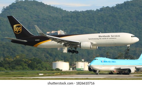 Georgetown, Malaysia- Jul 17 2020: A UPS 767F Landing In Penang International Airport. 