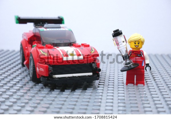 Georgetown, Penang / Malaysia\
- April 17, 2020 : Lego mini-figure woman racer with red Ferrari\
racing car