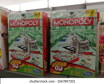 Georgetown Penang Malaysia. April 7 2018. Monopoly Boardgame By Hasbro For Sale On The Top Shelf Of Popular Bookstore.