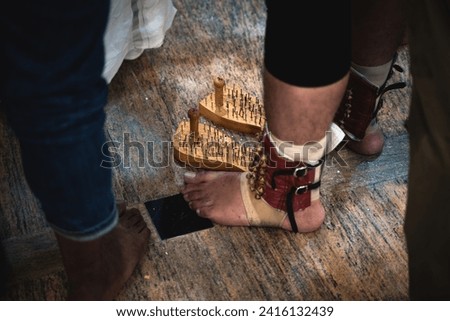 Georgetown, Penang, Malaysia - February 05, 2023: Nailed shoes of a Hindu devotee at the Thaipusam festival