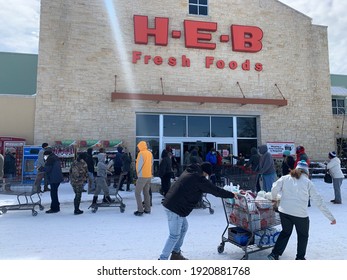 Georgetown, Texas - February 16: Shoppers Pushing Grocery Cart And Other Awaiting In Line In Front Of HEB Store After The Texas Blizzard Of 2021