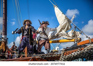 GEORGETOWN-CAYMAN ISLAND Pirate boat. men  women dressed as pirate sword fighting, participate a the Pirates Week 2012 from 8 to 18 November on November 10 2017 in Georgetown Cayman Island. Caribbean