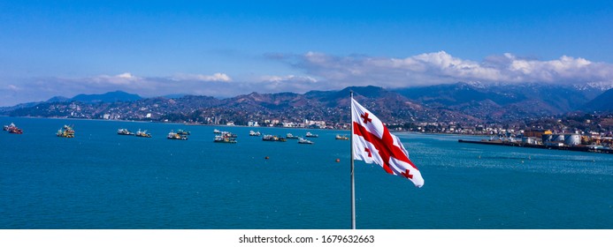 Georgia flag on the Black Sea background in Batumi with a drone, Adjara - Shutterstock ID 1679632663