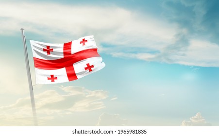 Georgia National Flag Waving In Beautiful Sky.