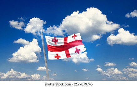 Georgia National Flag Waving In Beautiful Clouds.