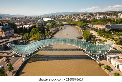 Georgia, Tbilisi, May 2022 - Aerial view of Bridge of Peace. It is steel and glass pedestrian bridge featuring a unique, contemporary design