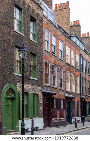 Georgian terraced town house in Spitafields London once the home of a wealthy Huguenot silk merchant and is a popular travel destination tourist attraction landmark of England UK stock photo image Stock photo © 