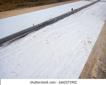 Geotextile Under Concrete Road Construction.