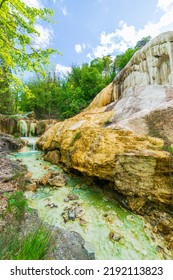 Geothermal Pool And Hot Spring In Tuscany, Italy. Bagni San Filippo Natural Thermal Waterfall In The Morning With No People. The White Whale Amidst Forest.