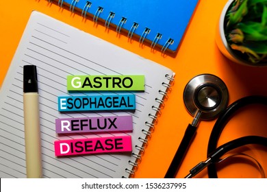 GERD. Gastro Esophageal Reflux Disease Acronym On Sticky Notes. Office Desk Background