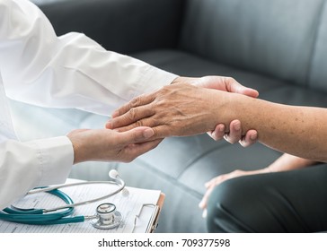 Geriatric Doctor (geriatrician) Consulting And Diagnostic Examining Elderly Senior Adult Patient (older Person) On Aging And Mental Health Care In Medical Clinic Office Or Hospital Examination Room 