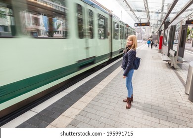 German Blonde Girl at Tram Stop in Bonn - Powered by Shutterstock