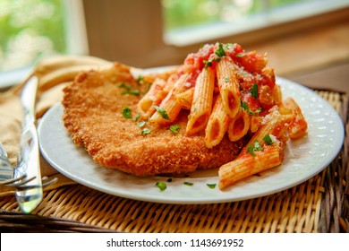 German Chicken Schnitzel With Penne In Red Tomato Sauce