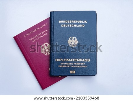 German diplomatic and regular EU style passport on white background