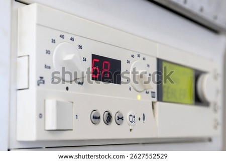 German error message on the control unit of a condensing gas boiler (translation: please open flap - error)