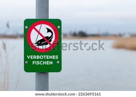 German fishing prohibited sign near lake - NO FISHING.