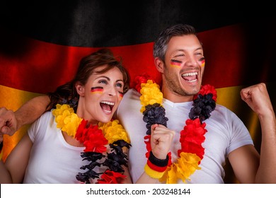 german flag soccer couple fans - Powered by Shutterstock