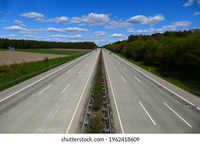 German highway A7 from above, sunny weather with some clouds, near Bispingen, district Soltau, Lower Saxony, Northern Germany.