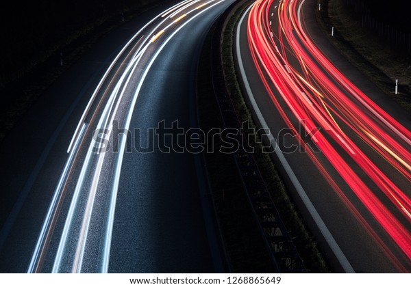 german Highway, light\
trails at night