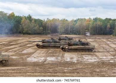 german main battle tanks drives on battlefield 