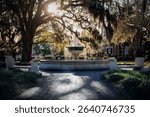 The German Memorial Fountain surrounded by Spanish moss at Orleans Square in Savannah, Georgia.
