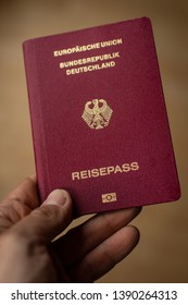 German Passport Is Held In Hand