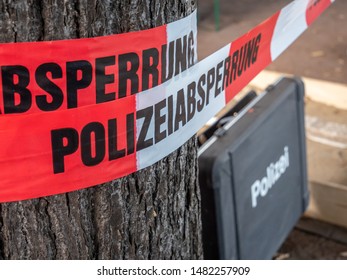 German Police Barrier Tape With Suitcase