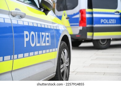 German police car on the street. Side view of a police car with the lettering 