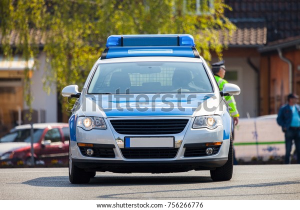 german police car on street, Polizei is the german\
word for police
