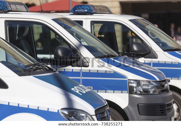 german police cars in a\
row