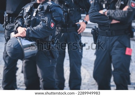 German police squad formation in protective gear with 