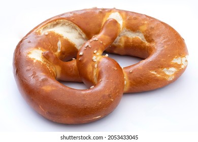 german pretzel with salt isolated on white