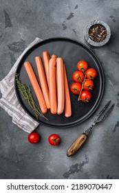 German Raw Frankfurter Sausages, On Gray Stone Table Background, Top View Flat Lay.