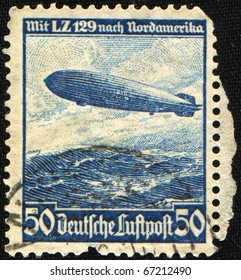 German Reich - CIRCA 1936: Airmail Stamp Printed In German Reich Shows Zeppelin LZ 129 Hindenburg Above North America