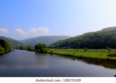 German River Lahn In Spring. Countryside Landscape With Hills And Dales.