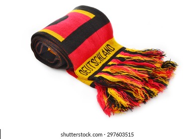 German Scarf In Red Black Gold Rolled Up Isolated On White With Text In German Language 