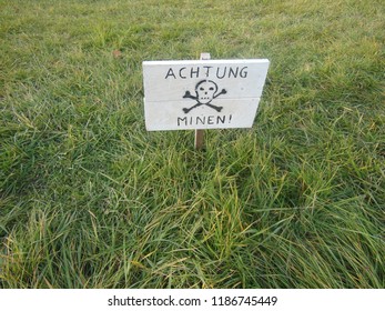 German sign on the grass
