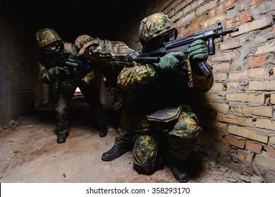 German Special Forces Group Soldiers With Rifles In Their Hands/German Special Forces Command