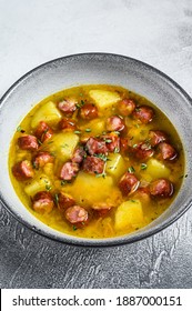 German Split Pea Soup With Smoked Sausages. White Background. Top View.