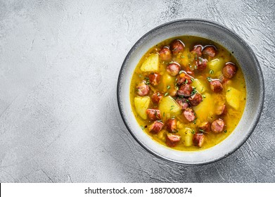 German Split Pea Soup With Smoked Sausages. White Background. Top View. Copy Space.