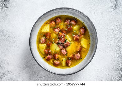 German Split Pea Soup With Smoked Sausages. White Background. Top View