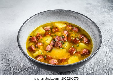 German Split Pea Soup With Smoked Sausages. White Background. Top View