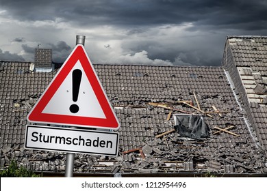 german Sturmschaden ( english translation: attention storm damage ) red warning sign in front of roof of house damaged by heavy hurricane tornado storm