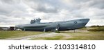 German submarine U-995. Dramatic sky, storm clouds. Museum ship, Laboe Naval Memorial. Germany. Panoramic view. Travel destinations, landmarks, sightseeing, history, past, war, WW2, nautical vessel